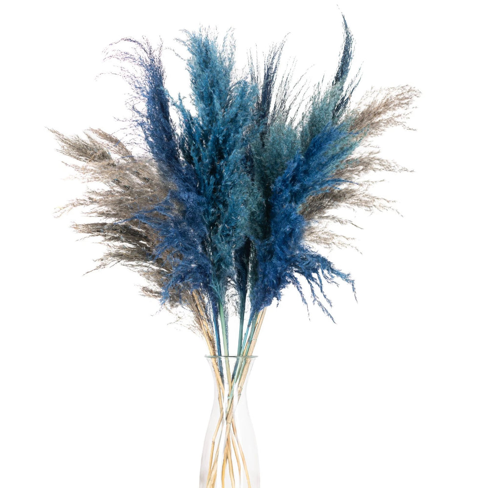 Decorative vase with pampas grass on a table in a living room setting