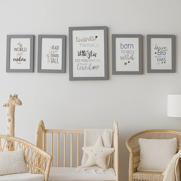 Nursery room with framed quotes on the wall, crib, and chair.