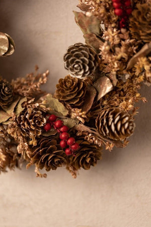 Scented Christmas wreath displayed on an indoor wall