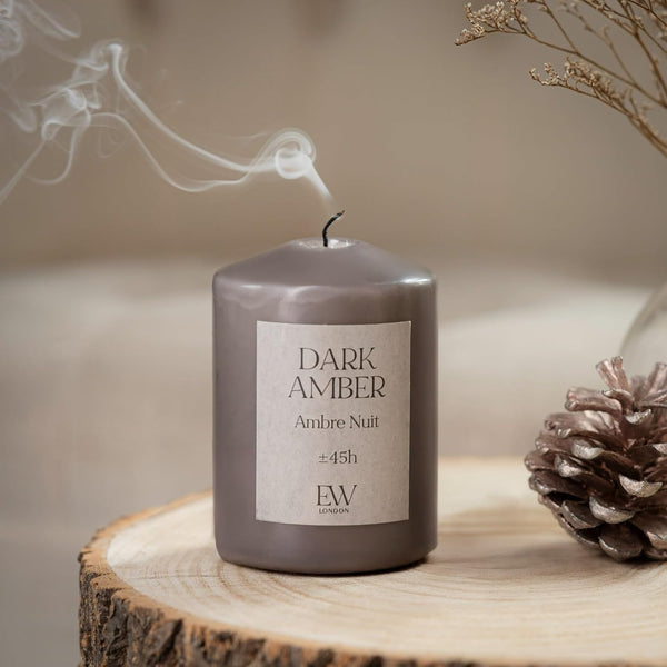 Small pillar candle suitable for gifting and home décor.