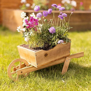 Scorched wood wheelbarrow garden planter