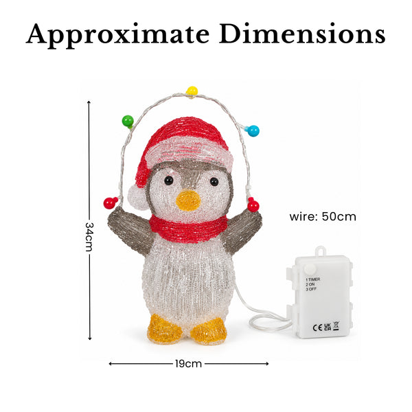 A penguin-shaped decorative light with a red Santa hat and scarf, yellow beak and feet, and multicolored wire holiday lights, shown with dimension labels reading 34cm height, 19cm width, and wire length 50cm on a white background.