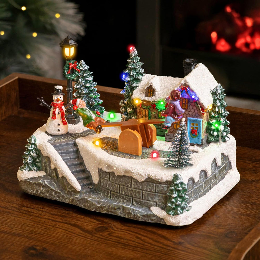 17cm musical see-saw Christmas village scene ornament