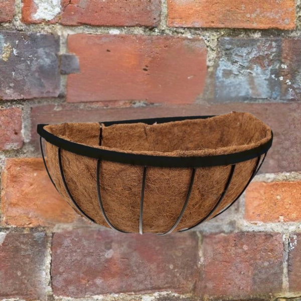 Decorative black hanging basket for patio walls.
