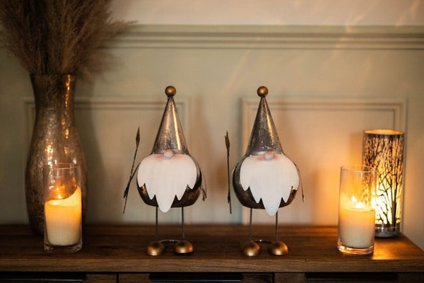 Set of two silver and gold Christmas gonk figurines