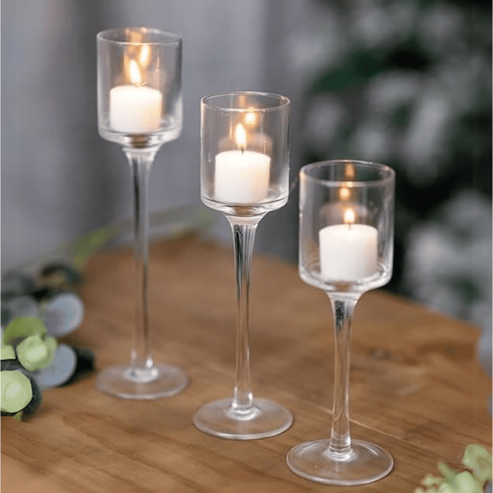 Set of three glass candle holders