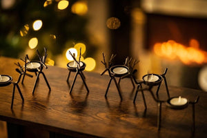 Set of six reindeer tea light candle holders