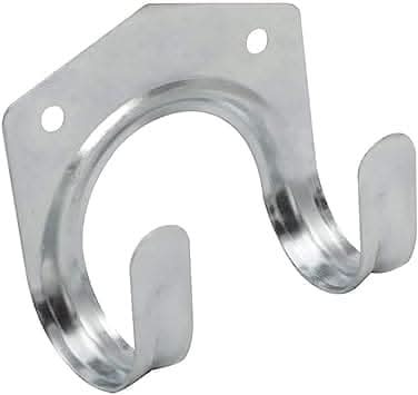 Shed storage hooks holding spades and garden forks