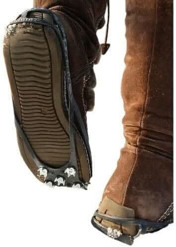 Rubber shoe grippers with metal studs underneath