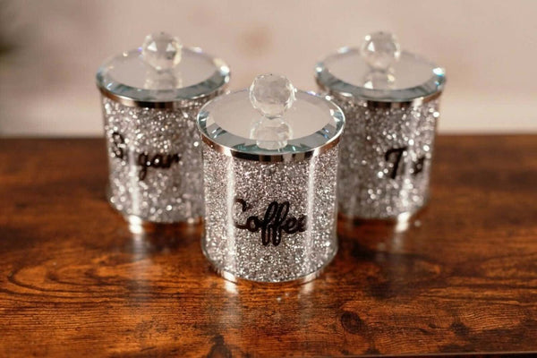 Three crushed crystal kitchen storage jars