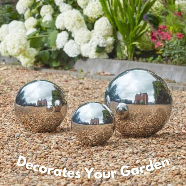 Silver polished garden mirror ball displayed outdoors