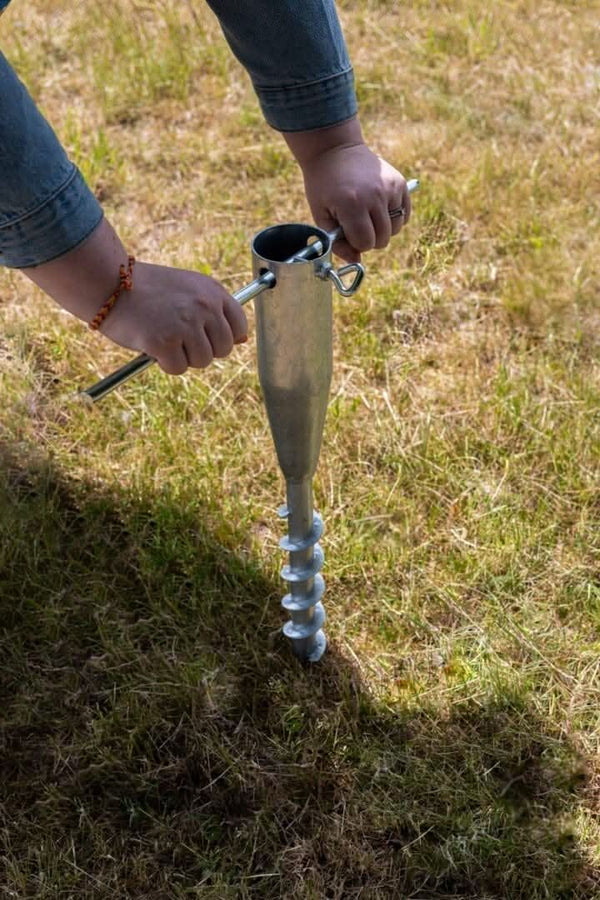 Durable outdoor ground anchor for poles and gazebos