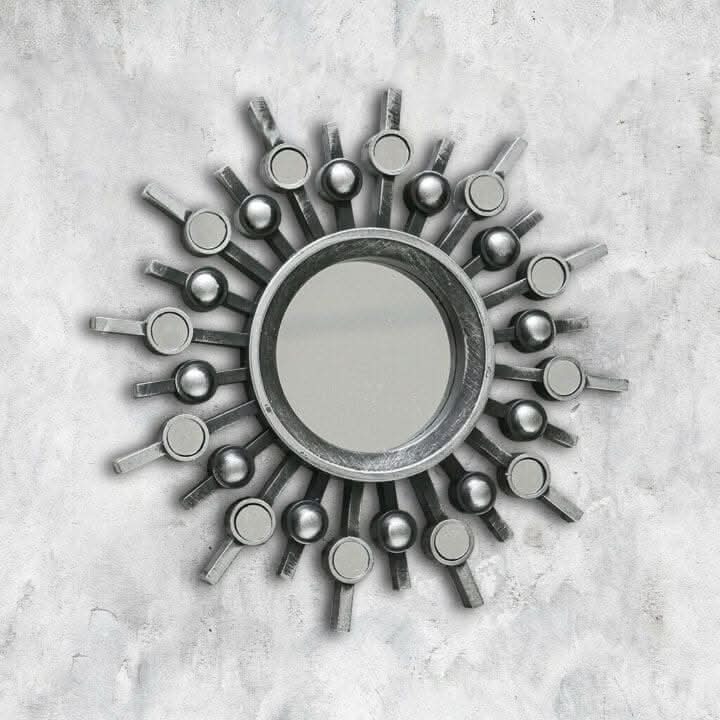 Set of three silver sunburst wall mirrors