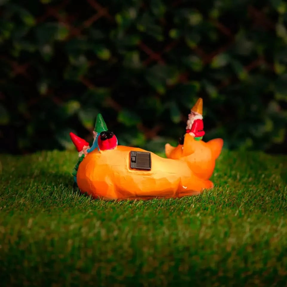 Solar-powered sleeping fox garden ornament