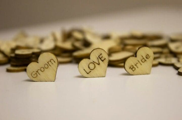 Wooden wedding heart confetti with mixed messages