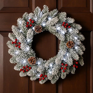 Decorative winter wreath with red berries.
