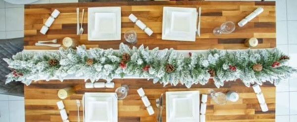 Nine foot festive garland arranged along a staircase