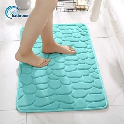 Cyan absorbent bath mat with soft memory foam cushioning