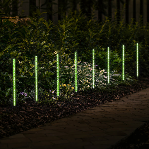 Clear bubble crystal tubes illuminated after dark