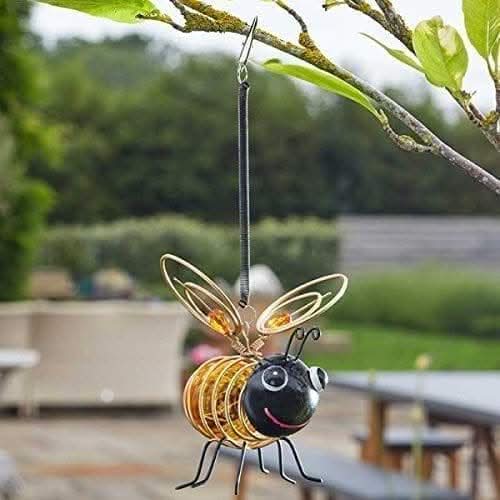 Solar powered bee ornament featuring four copper LED lights