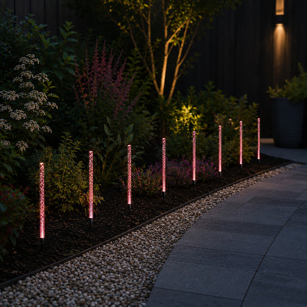Colour changing pathway lights glowing at night