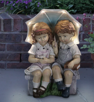 Solar boy and girl umbrella garden ornament