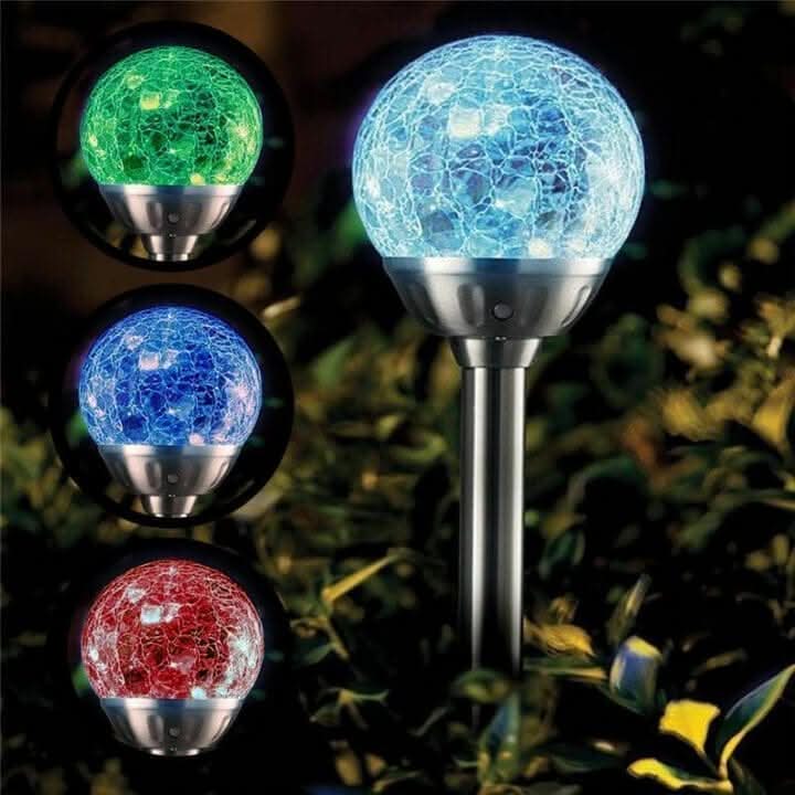 Solar colour changing crystal ball garden stake lights on pathway
