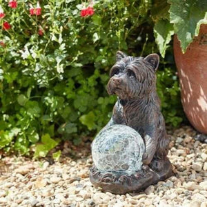 Hand painted dog statue with crackle glass ball
