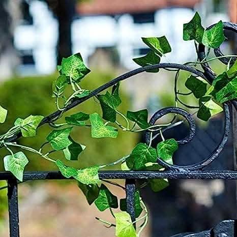 Decorative flower lights hanging from garden branches