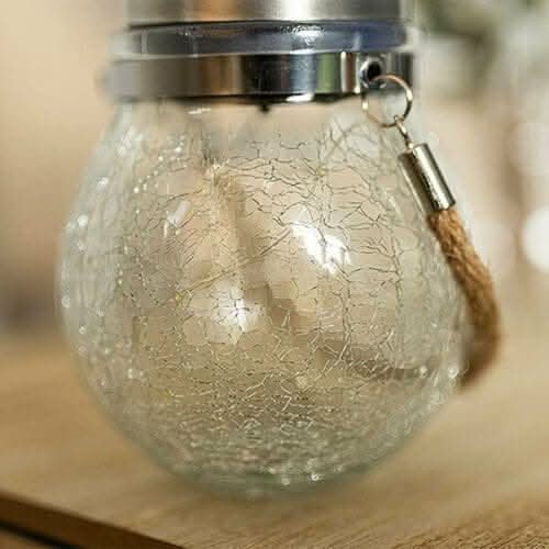 Hanging garden lantern with solar powered LED firefly lights