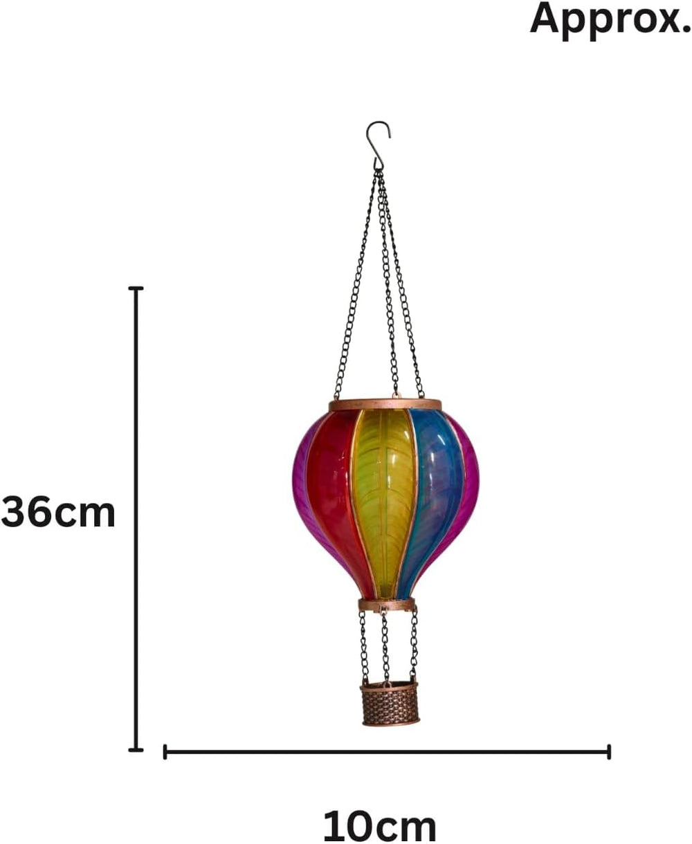 Solar hot air balloon lantern hanging in garden