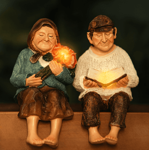 Grandmother and grandfather solar garden ornament set