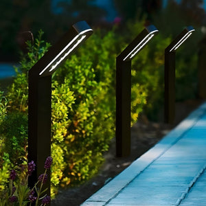 Three waterproof solar garden stake lights