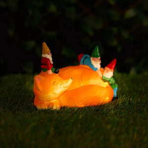 Solar sleeping fox gnome garden ornament with LED light