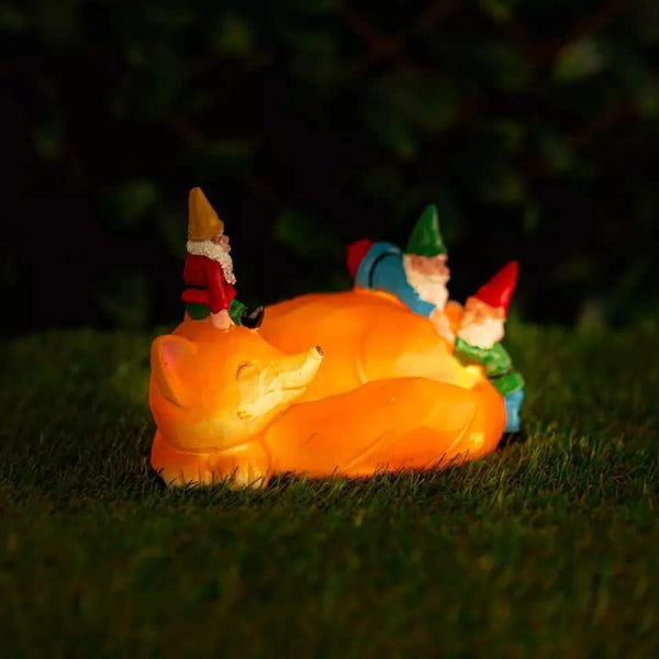 Solar sleeping fox gnome garden ornament with LED light