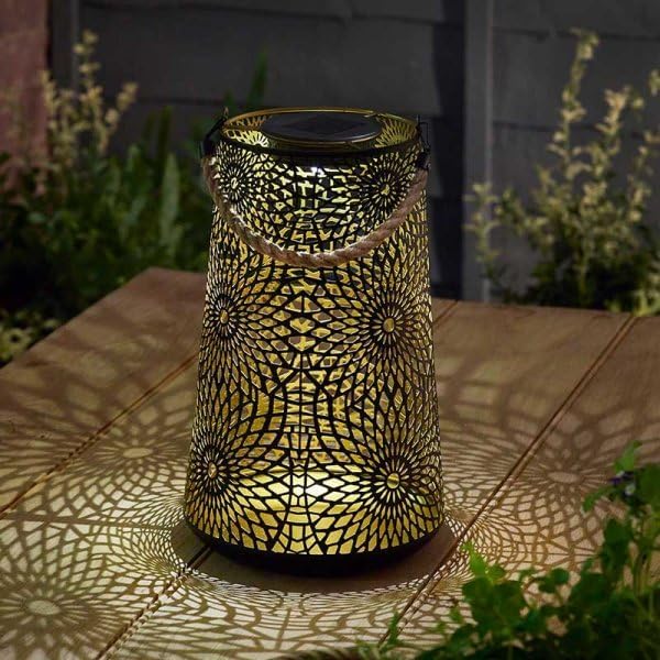 Solar-powered Moroccan metal lantern with warm white LED.