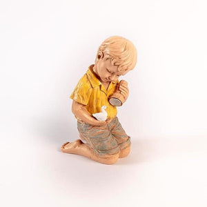 Weather resistant resin statue displayed in a garden