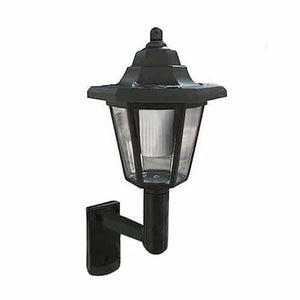 Solar powered LED wall lantern shown outdoors