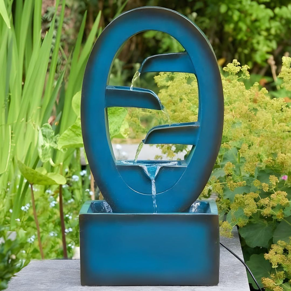 Azure blue solar cascade garden fountain.