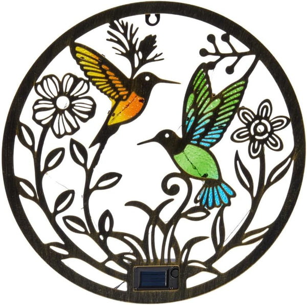Waterproof hummingbird solar light for garden walls.