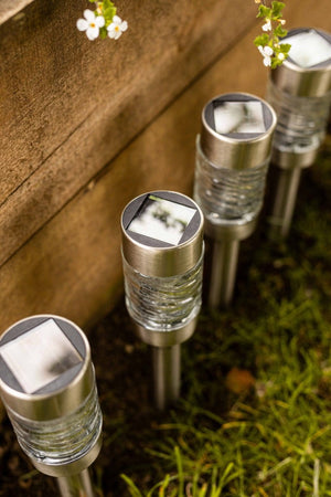 Removable solar lantern shown on tabletop