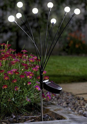 Solar starburst garden light with flexible LED flower stems