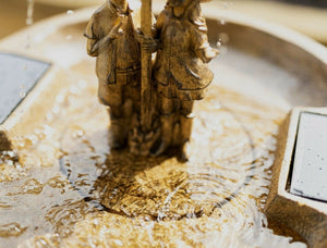 Vintage style fountain creating a relaxing outdoor display