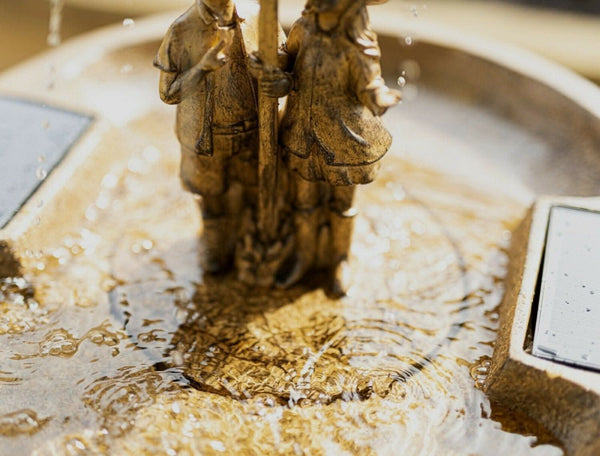 Vintage style fountain creating a relaxing outdoor display