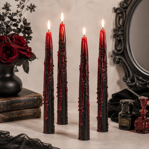 Vampire inspired taper candles arranged as a centrepiece
