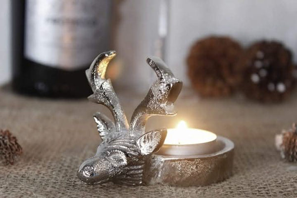 Decorative stag head candle holder displayed indoors