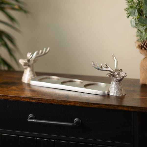 Three candle holder styled on a dining table