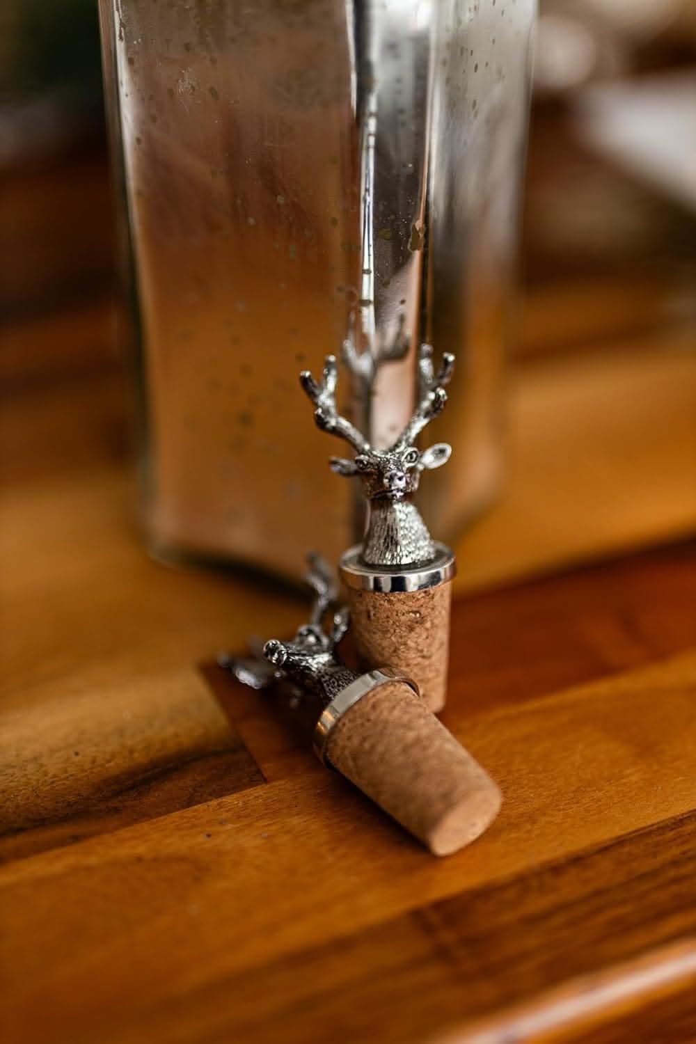 Three silver stag cork bottle stoppers