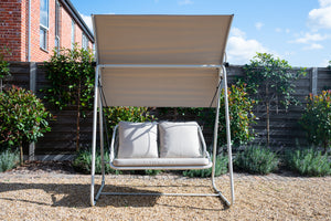 Beige outdoor seating swing