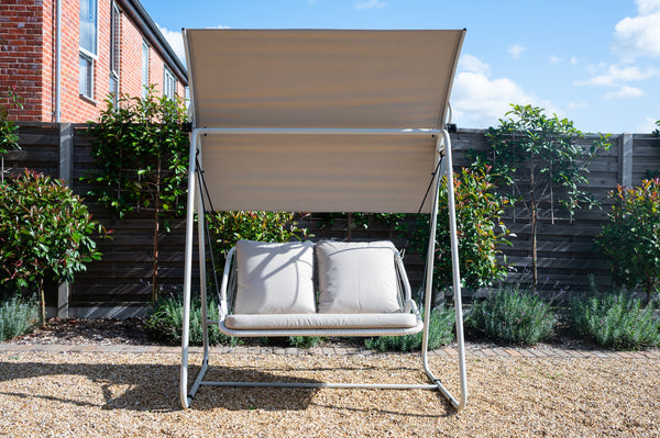 Beige outdoor seating swing